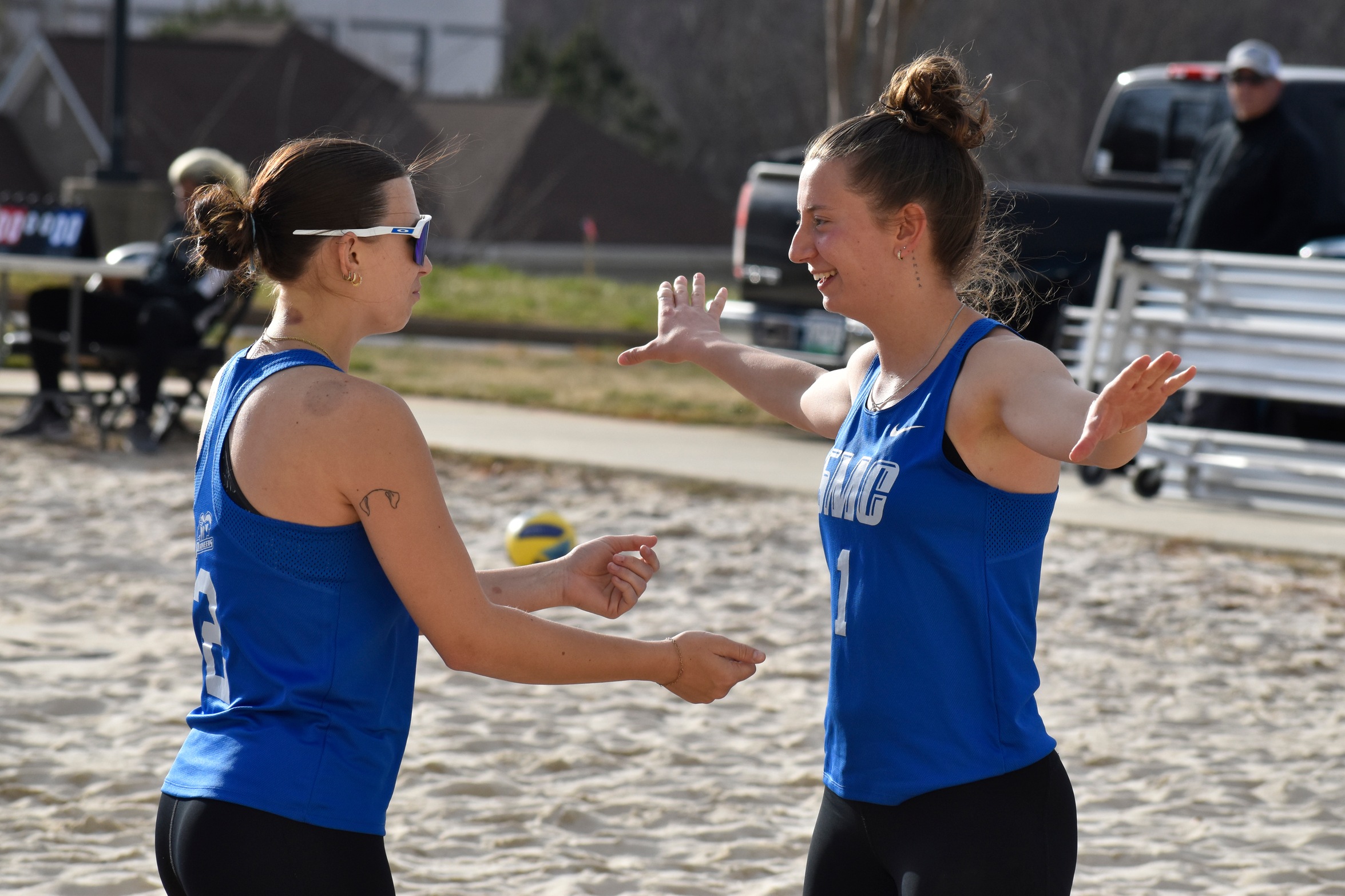 No. 2 duo of Layla VanAernem (left) and Hana Vucinic (right) celebrate their win at No. 2. Photo by SMC Sports Communications